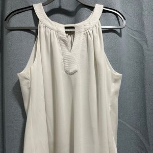 White flowing tank